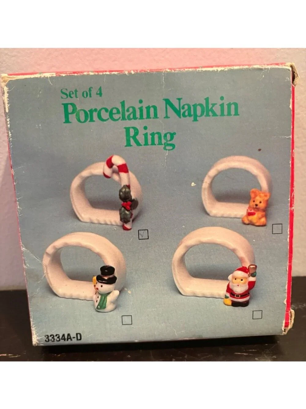 Set Of 4 Porcelain Christmas Napkin Rings Santa & Candy Cane Design